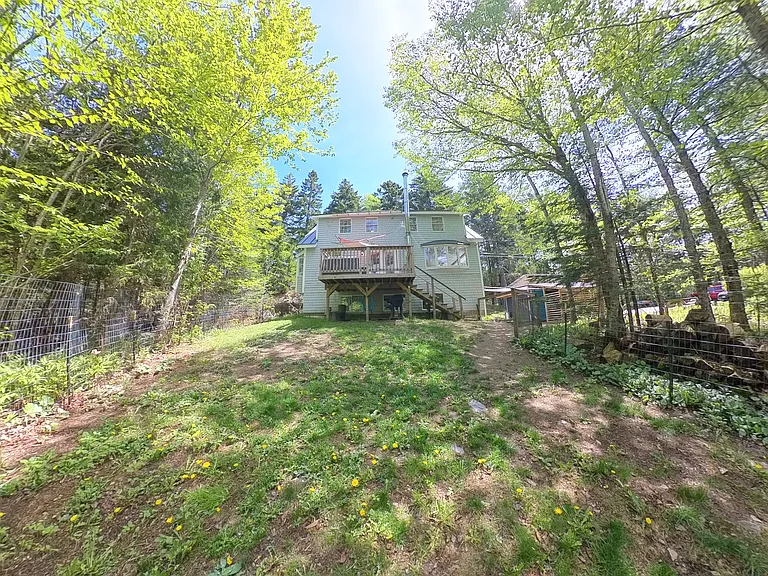 Large, fenced-in backyard