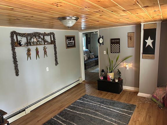 OFFICE & LIVING ROOM FROM ENTRANCE