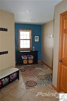 Nothing more practical than a 4 car garage with adjacent mud room, laundry, 1/2 bath