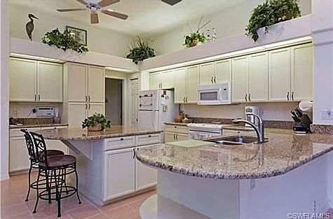 Brand new granite counters and cabinet fronts professionally pai