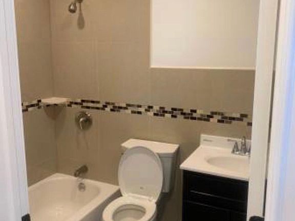 5th image of 3707 E Tremont Ave Frnt 2