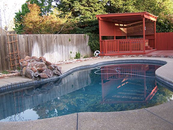 Built in pool w/ waterfall and personal spa