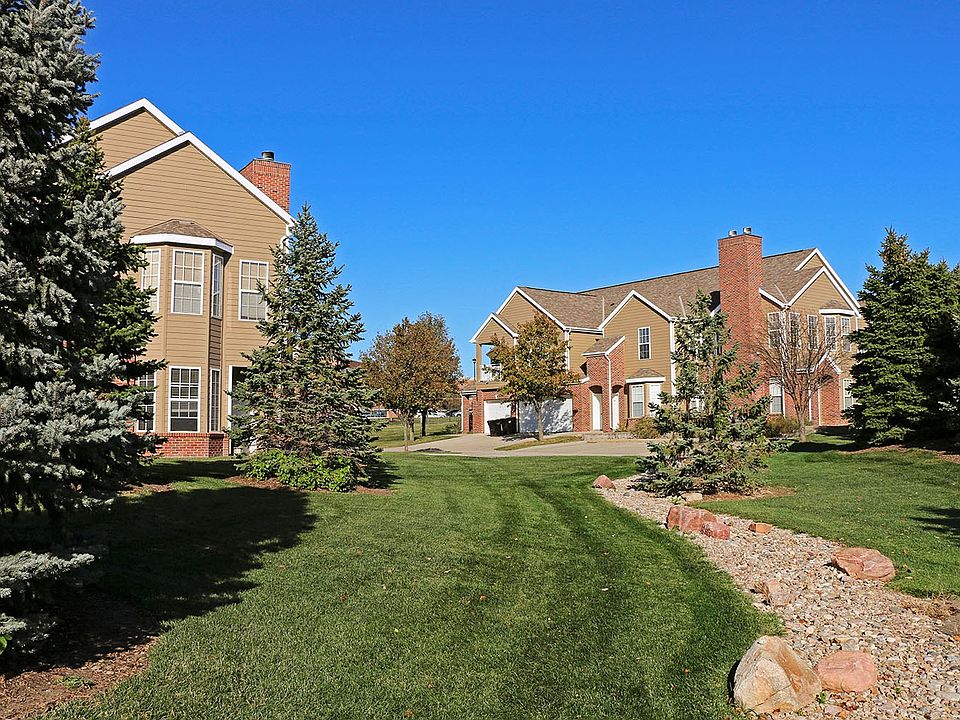 Tree-lined and beautifully landscaped green spaces create a welcoming community atmosphere.