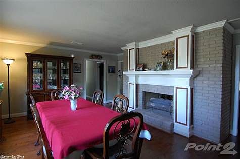 LARGE DINING WITH 2 SIDED FIRE PLACE. BRICK!
