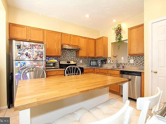 Spacious kitchen with granite counters
