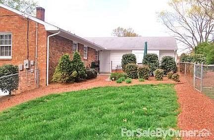 Exterior Back
						:
						Nicely landscaped rear yard with patio and storage . All included within fence.