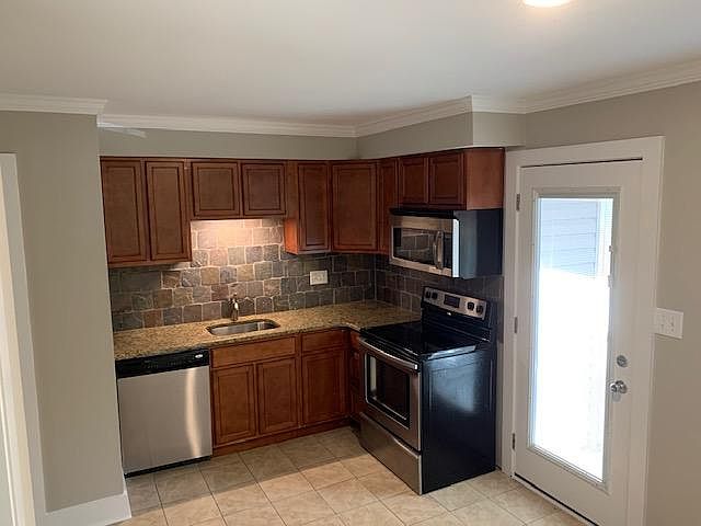 Kitchen w/ stainless steel appliances