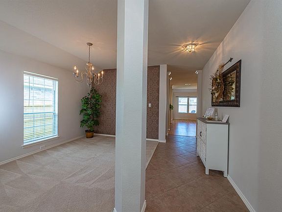 The formal dining room can be used as a study or sitting area.