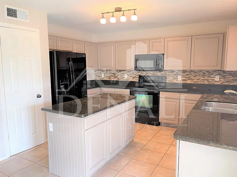 8535 W Vogel Ave — Photo 6