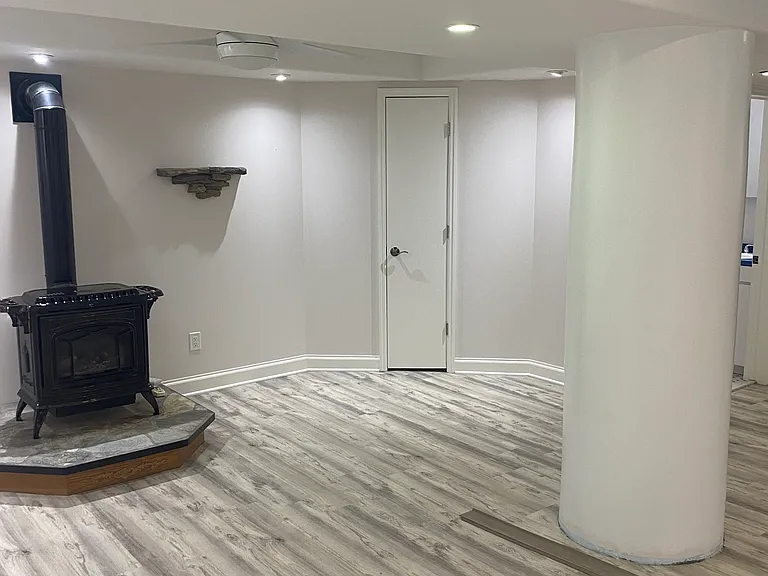 Fireplace downstairs finished basement with bathroom