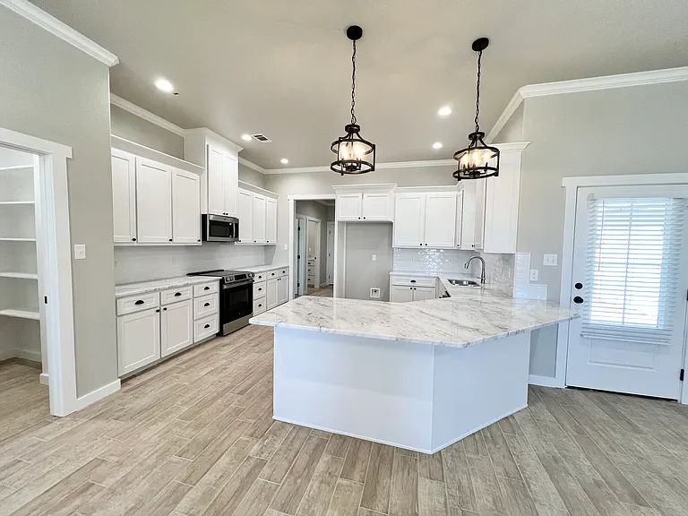 Kitchen with lots of cabinet space and countertops