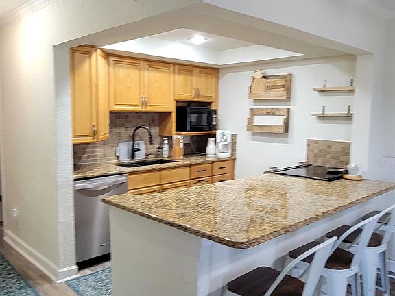 5th image of 1 N Ocean Palm Villas #1