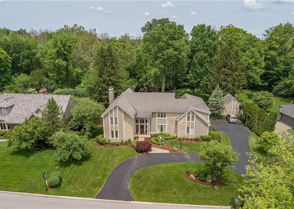 Beauitful drone shot . Yard is beyond the fence and creek in the back