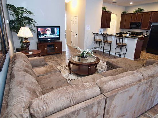 BC6P416BC-family-room-with-wide-flat-screen-tv