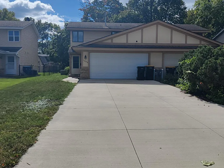 Newer concrete driveway, 2 car attached garage.