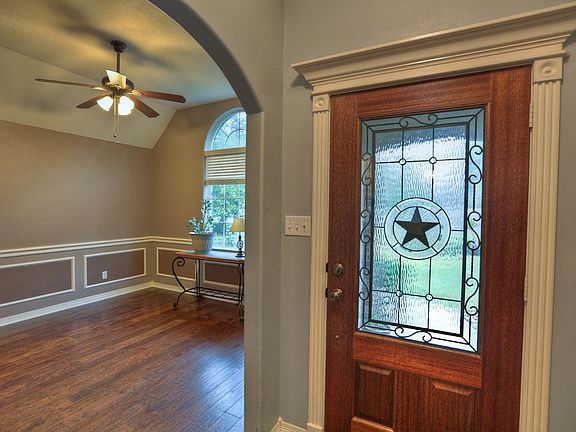 Interesting architecture, mahogany & leaded glass door