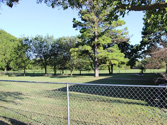 Front Yard, fully fenced.