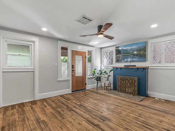 Living room view towards front entry