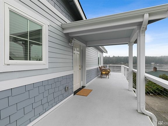Views abound from almost every room in the home, including a wonderful view from the entryway deck.