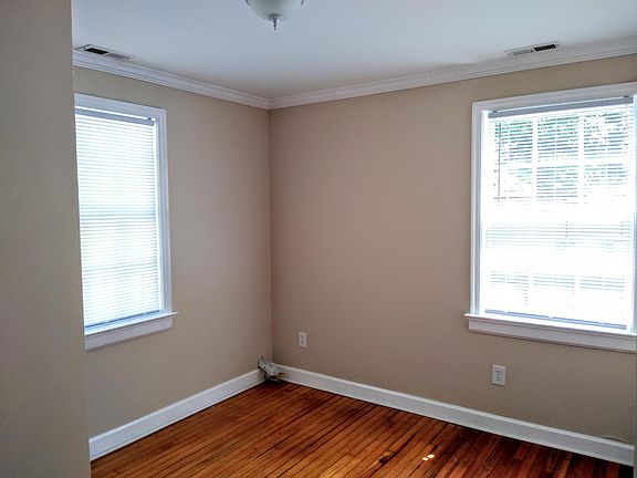 Bedroom 1. With energy efficient new washer/dryer closet area.