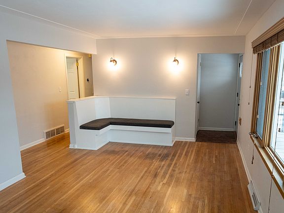 Living room has built-in seating