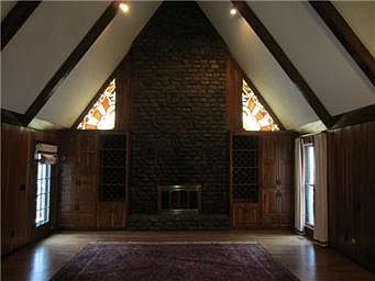 Great room with imported cobblestone fireplace.