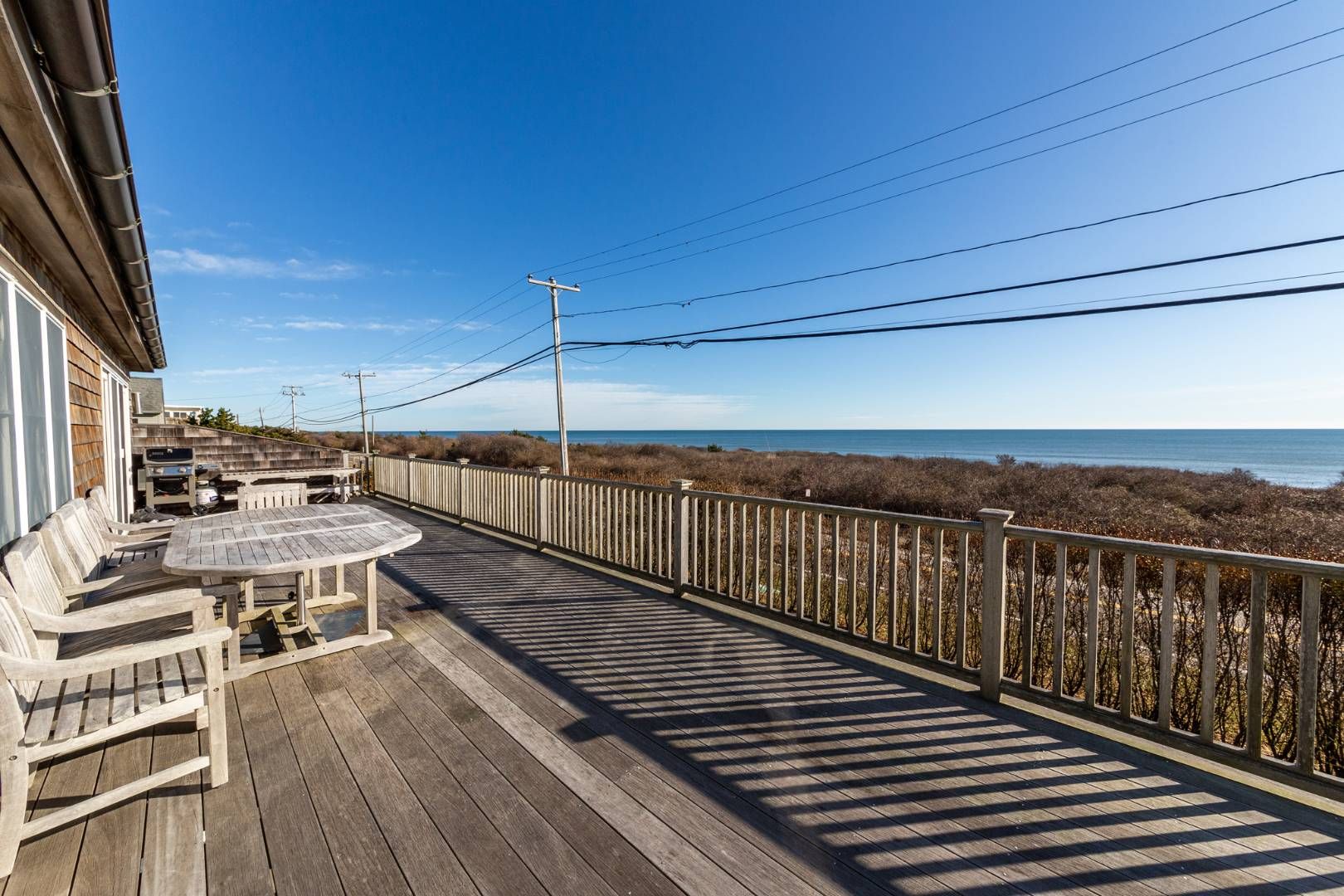  Upstair's deck with dining table and Ocean Views