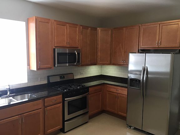 Ceramic Tile with Stainless Steel Appliances (Brand New)