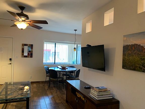 Looking from hallway toward living room and dining area.