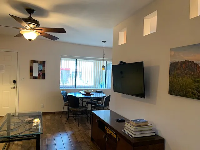 Looking from hallway toward living room and dining area.