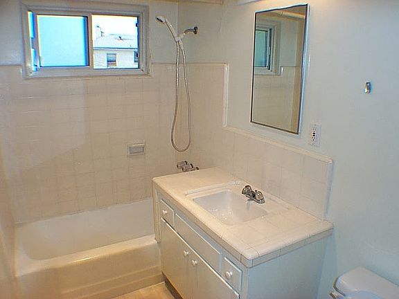 Bath (Stock photos do not show upgraded tile flooring and hi