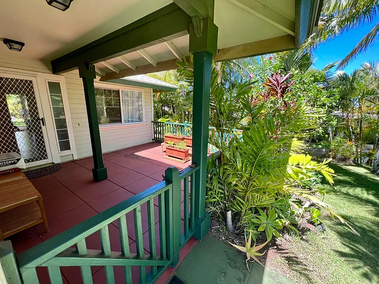 front door with herb garden