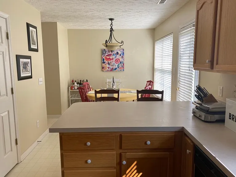 This is an old photo before the cabinets were painted