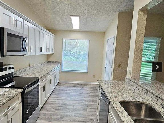 4th image of 11615 Longwood Key Dr E