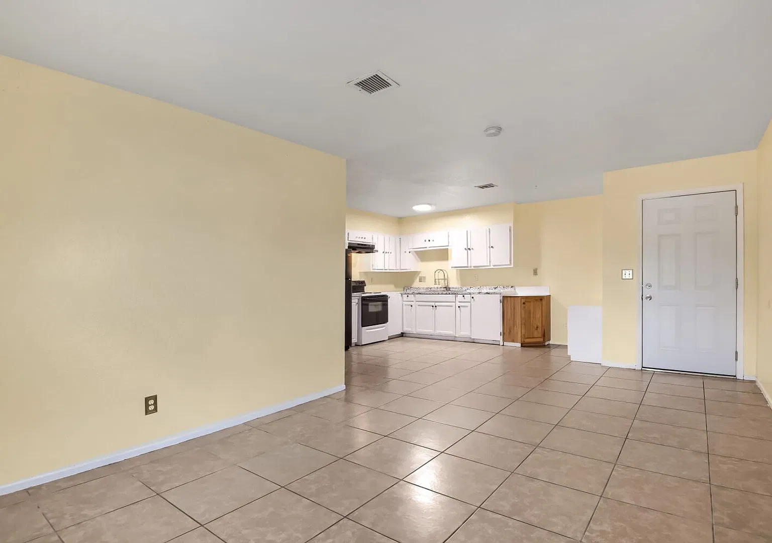 2-Bedroom Home with Large Backyard, Covered Patio & Laundry Room — Photo 2