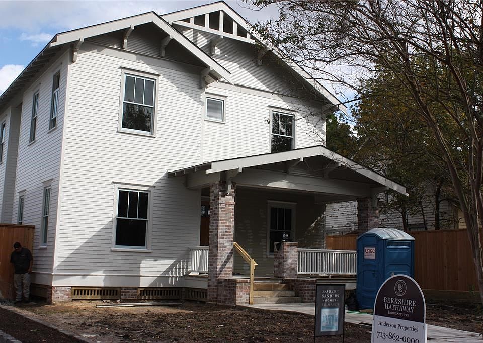 New construction built in the historic district.  It captures style elements from the past and smartly pairs them with today's amenities
