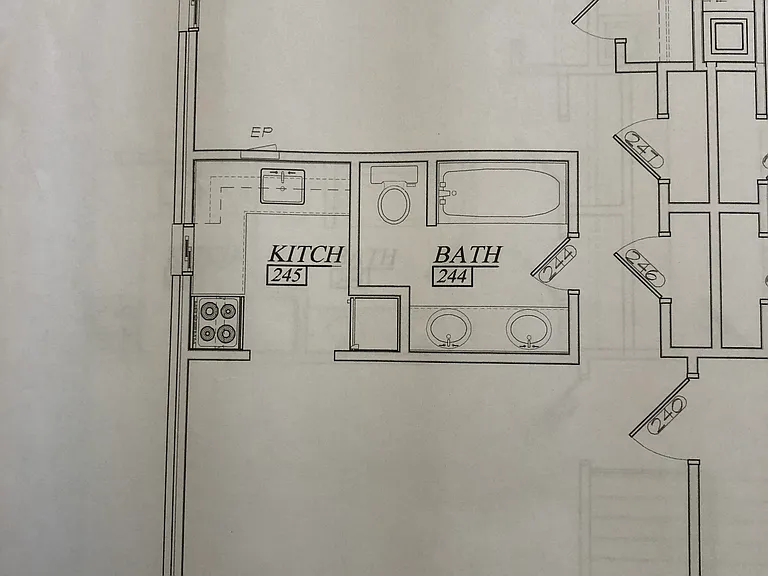 Typical apartment layout . Bedroom area not labeled.