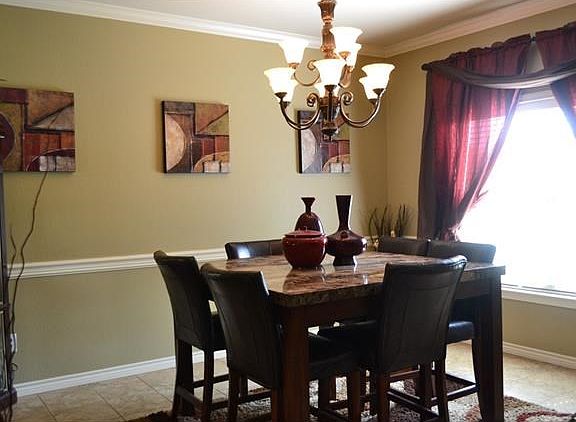 Formal dining area directly to your right when you enter the home.