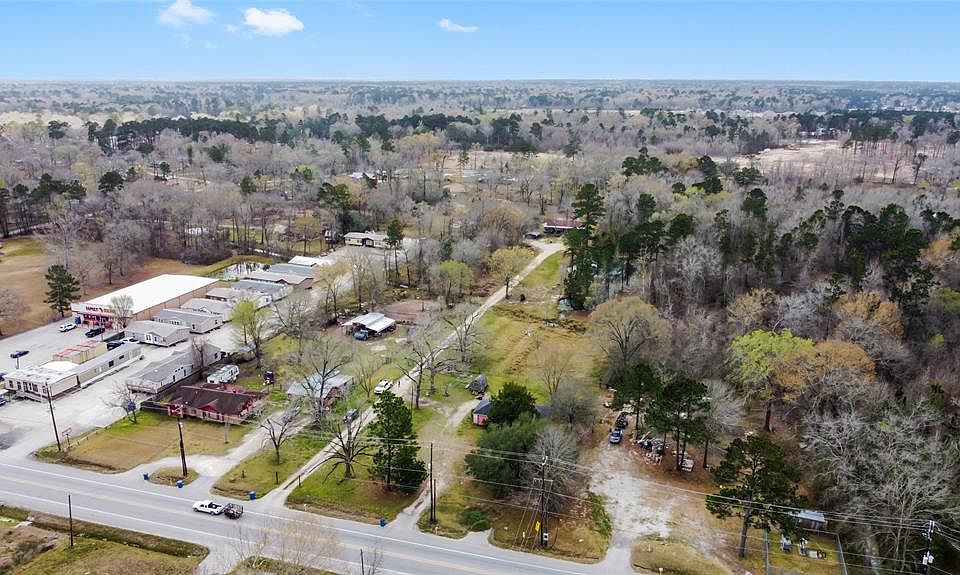 Aerial view of the property looking South East. Family Dollar pictured on the East side. Amazing commercial potential with frontage on FM 2090!