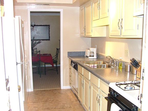 kitchen opens to 12+ dining room