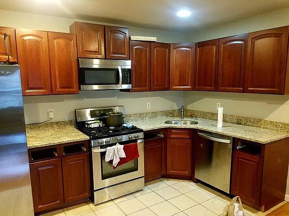 Kitchen opens to living room