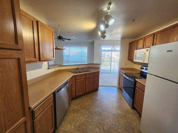 5th image of 5755 N Genoa Way APT 208
