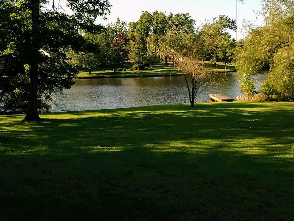 Peaceful lake view with dock