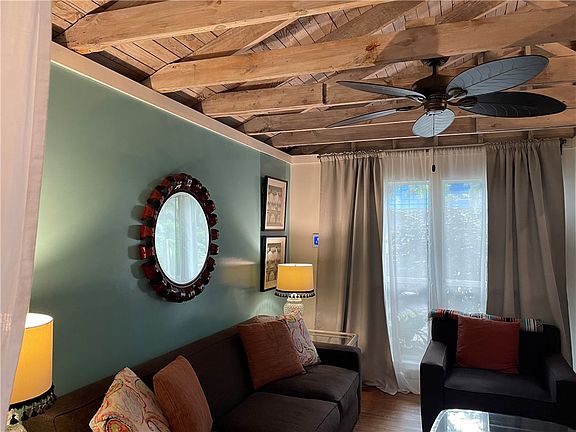 LIVING ROOM WITH VAULTED CEILINGS
