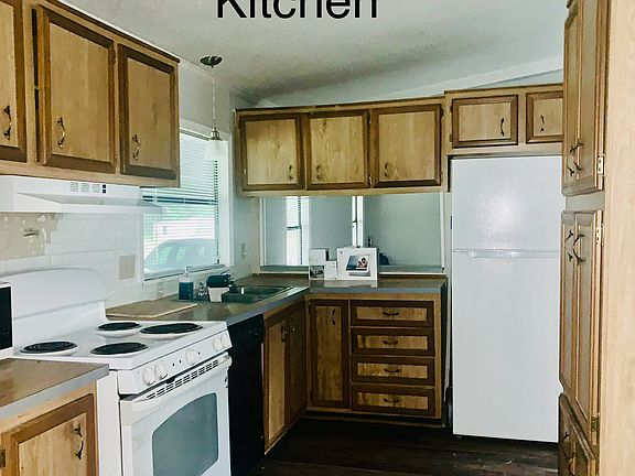 Kitchen has a walk in pantry