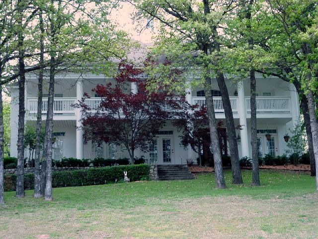 Stately Southern Colonial home tucked away in the back of the neighborhood