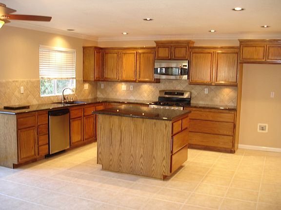 Eat-in Kitchen with Granite and Tile