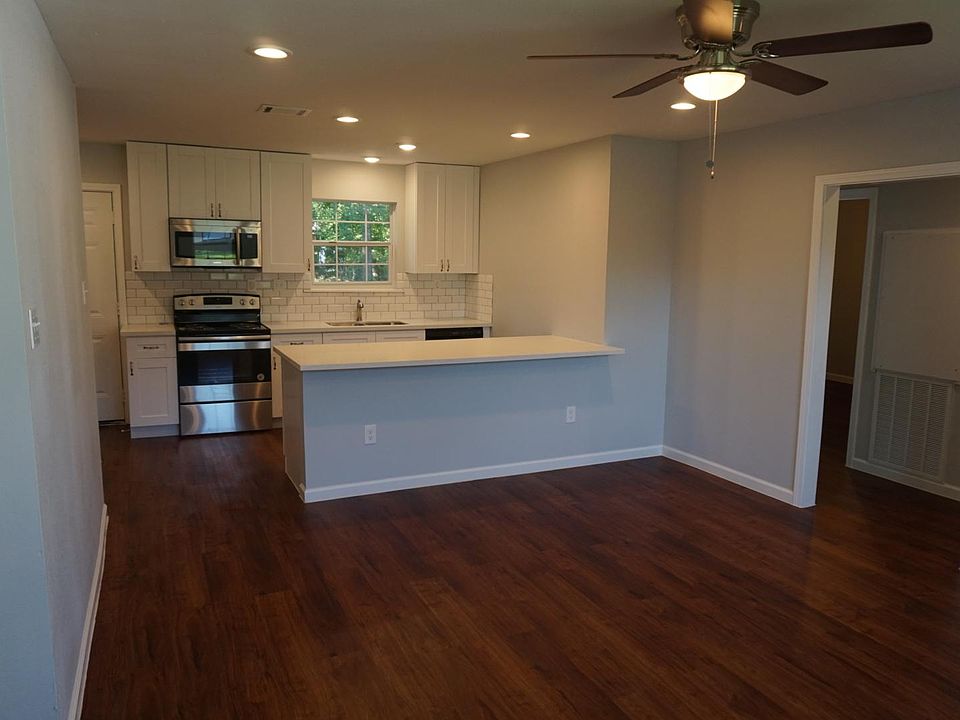 Modern kitchen with brand new stainless steel appliances