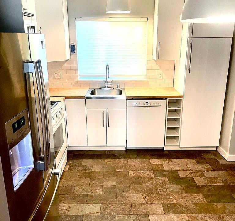 Kitchen includes refrigerator (for life of refrigerator)