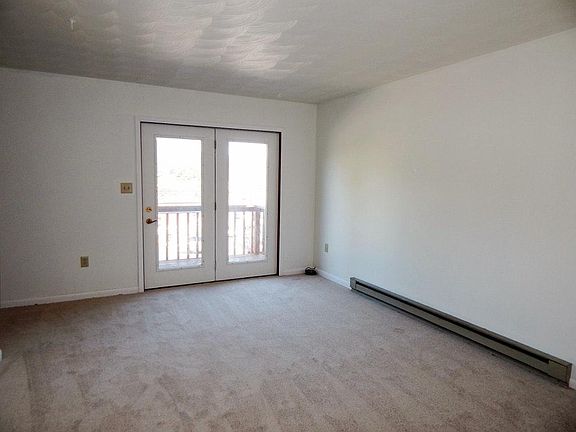 living room with door to balcony